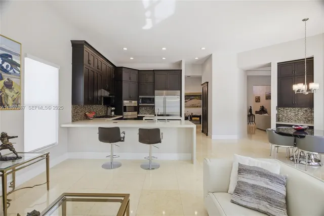 a spacious bedroom with a bed and a couch