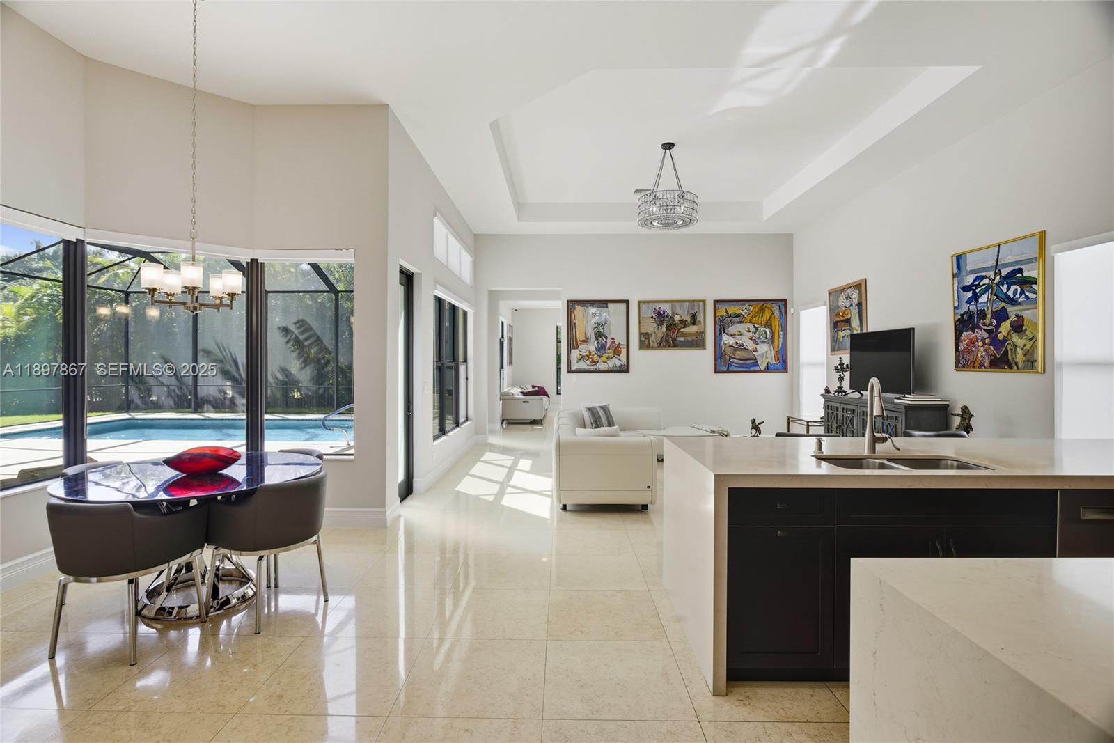 9772 Rennes Lane Delray Beach, FL 33446 - Photo 19 of 59 a living room with furniture and a large window