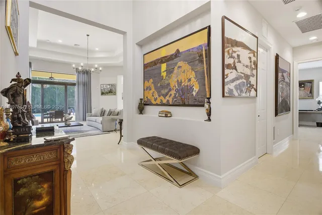 a view of a kitchen with a sink and cabinets