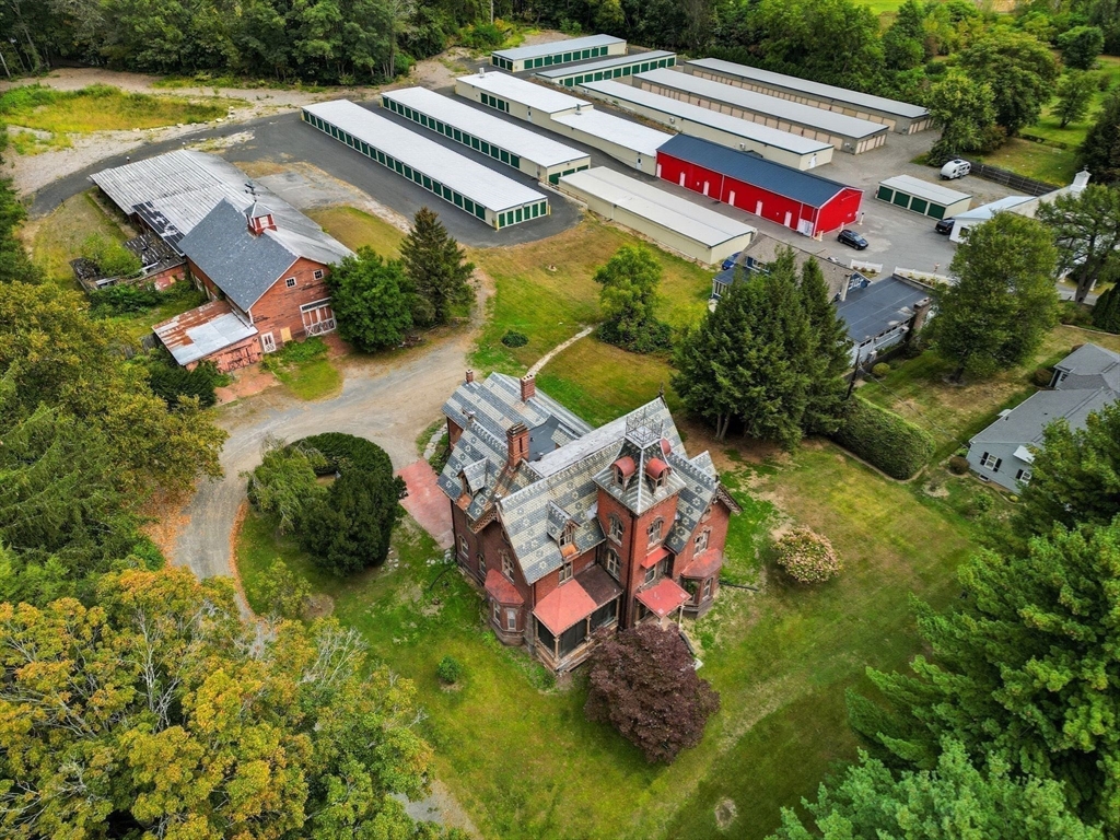 swimming pool with yard and outdoor seating