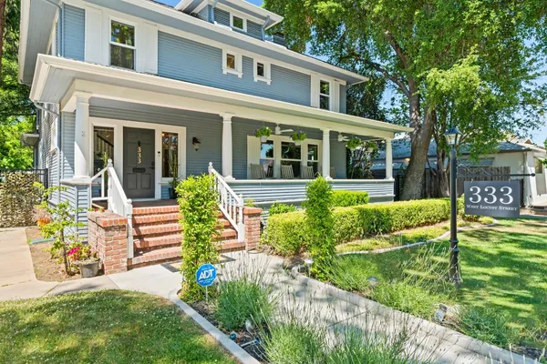 front view of a house with a yard