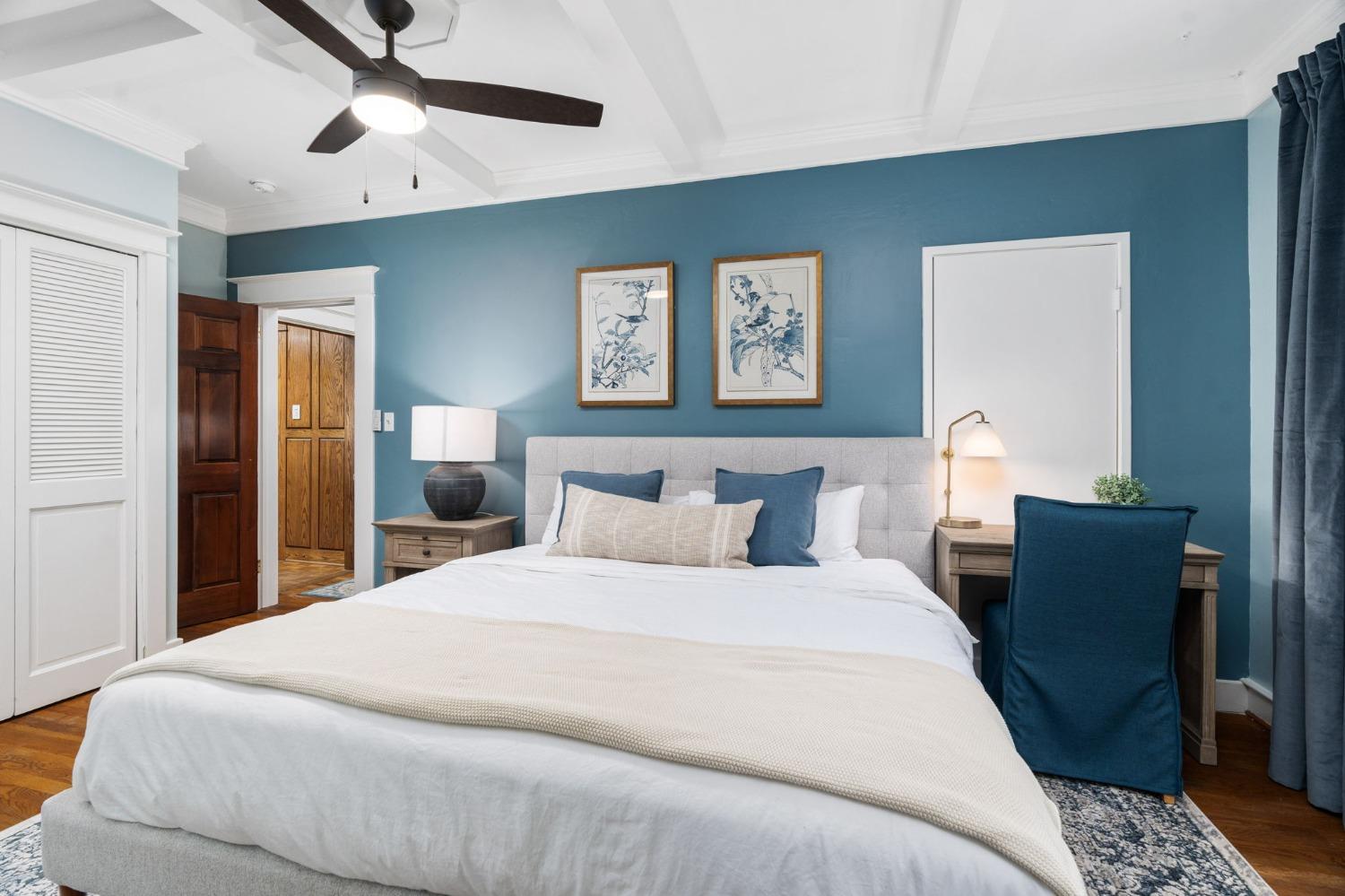 333 West Locust Street Lodi, CA 95240 - Photo 17 of 32 a bedroom with a bed and wooden floor