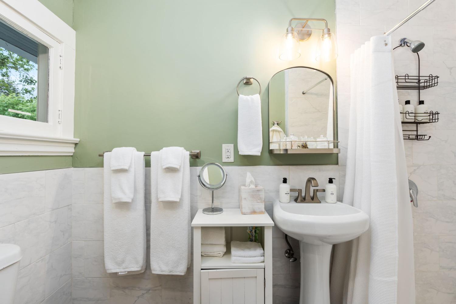 333 West Locust Street Lodi, CA 95240 - Photo 25 of 32 a bathroom with a sink and a mirror