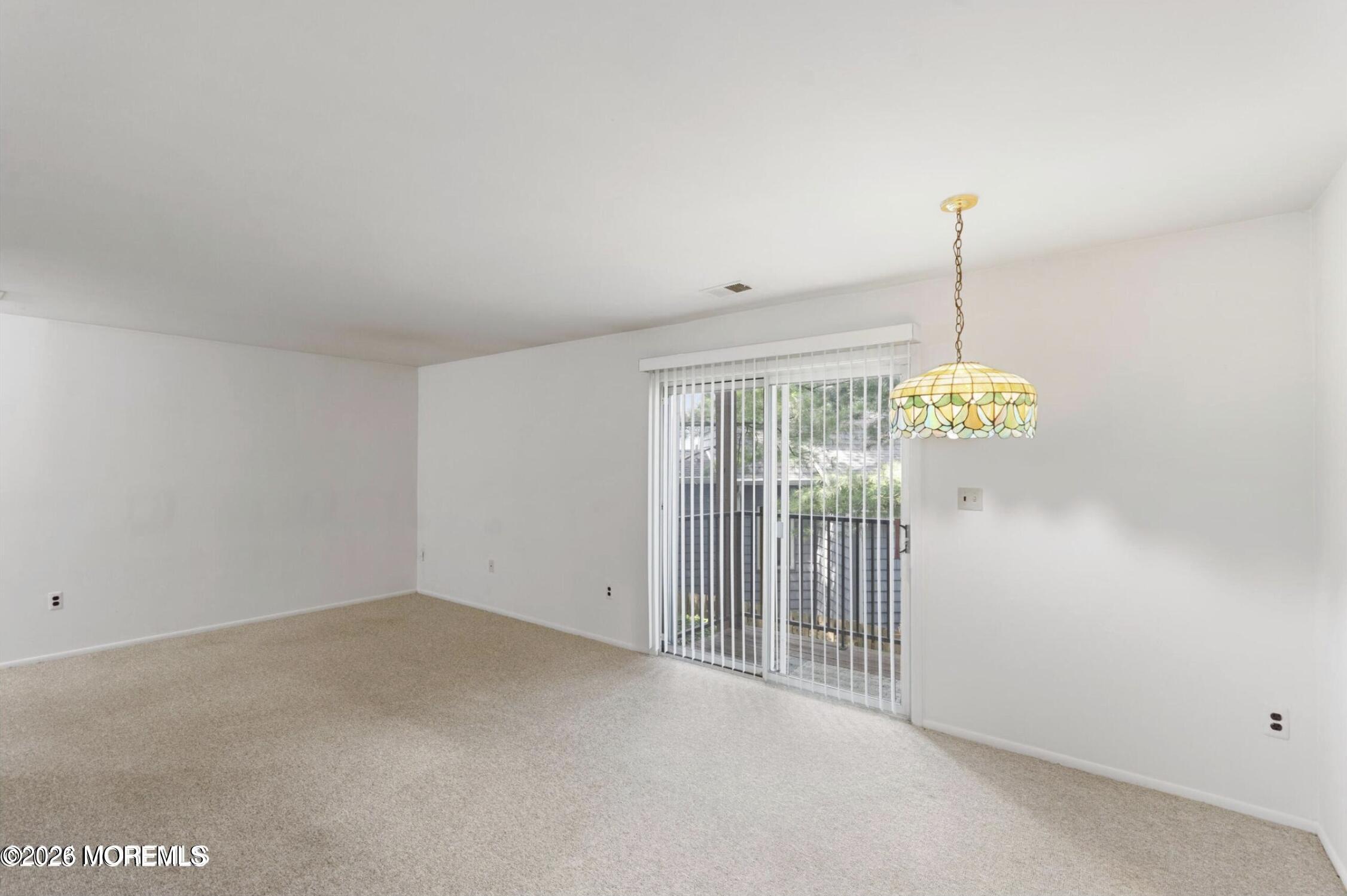 1606 Main Street, Unit R209 Lake Como, NJ 07719 - Photo 7 of 26 a view of empty room with window