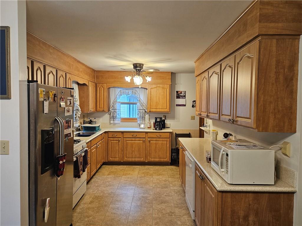 354 Thompson Road Chicora, PA 16025 - Photo 4 of 30 Plenty of cabinetry with corian countertops