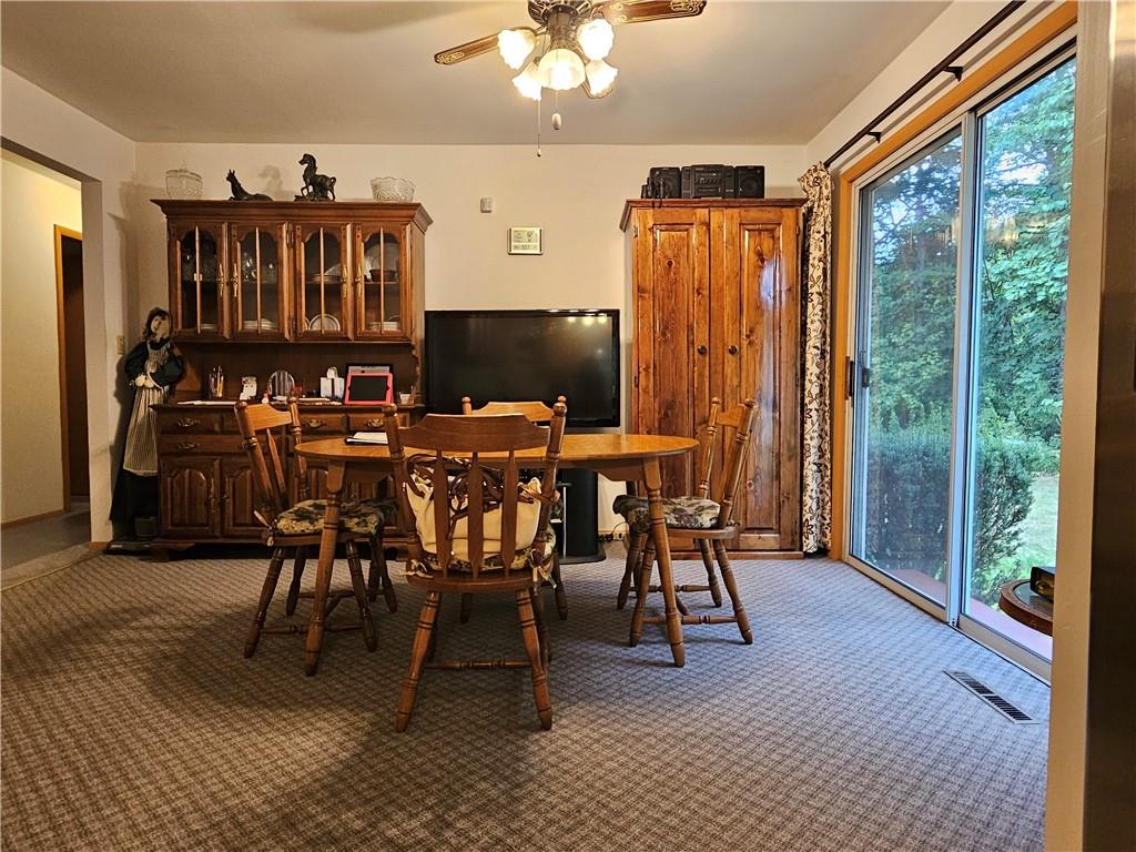 354 Thompson Road Chicora, PA 16025 - Photo 6 of 30 Dining room with doors to the back yard.