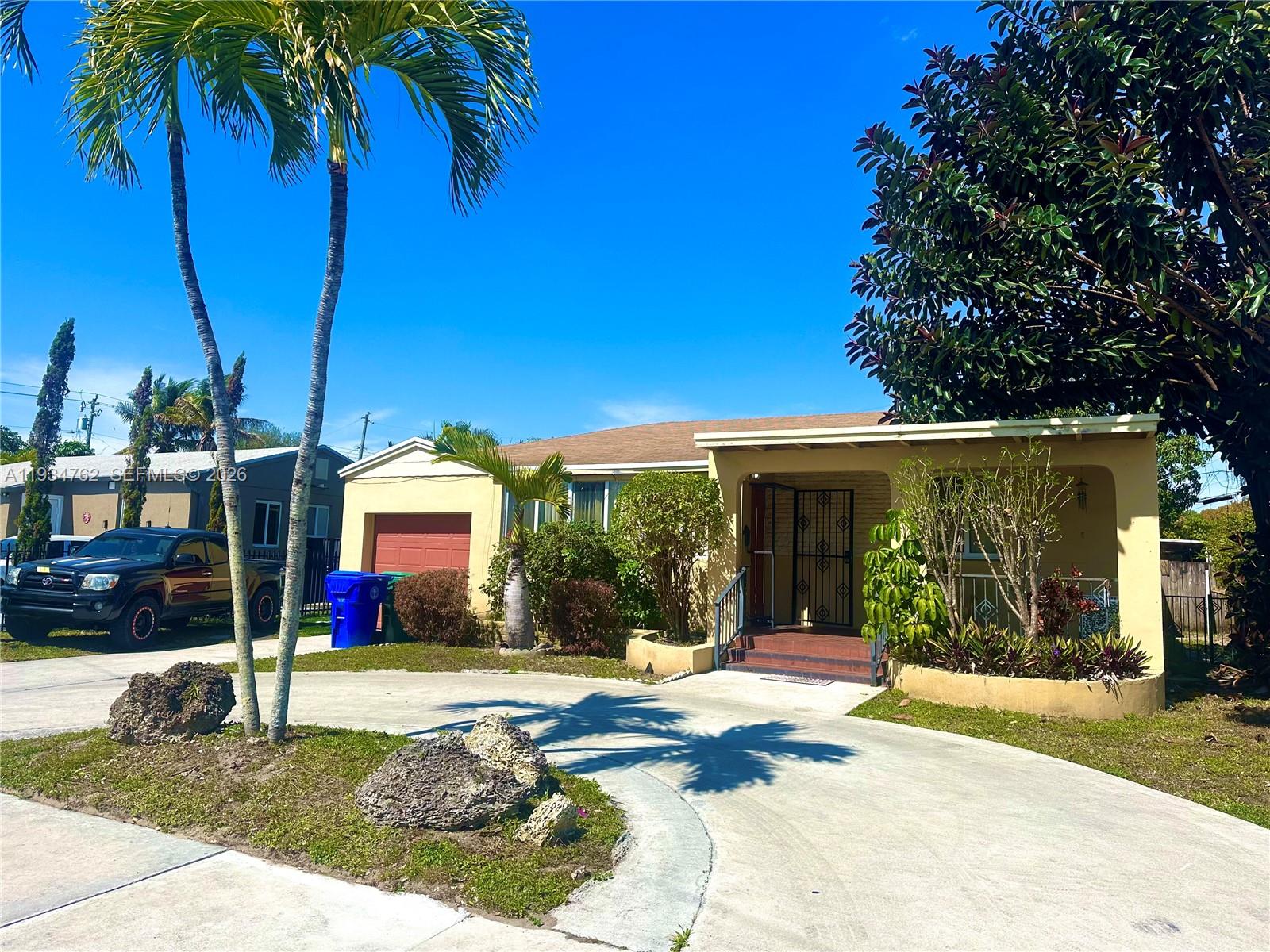 4361 Southwest 3rd Street Miami, FL 33134 - Photo 2 of 24 a view of a house with a patio
