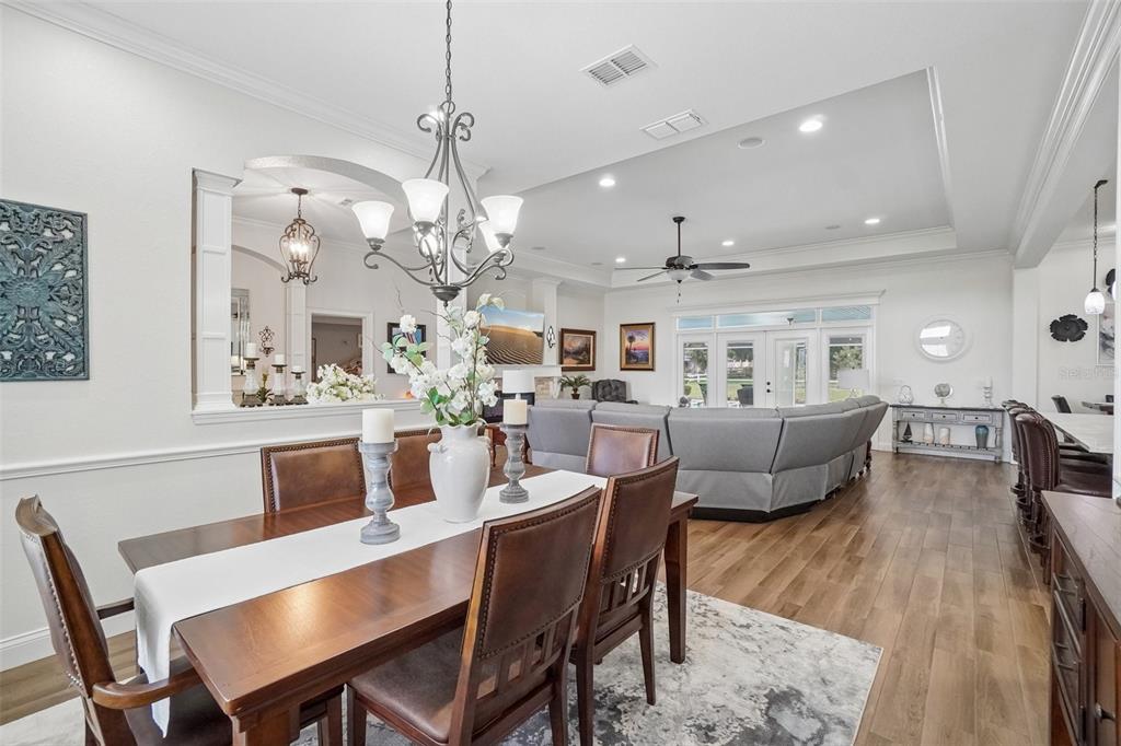 3934 Connersville Road Bartow, FL 33830 - Photo 20 of 81 a view of a dining room with furniture and wooden floor