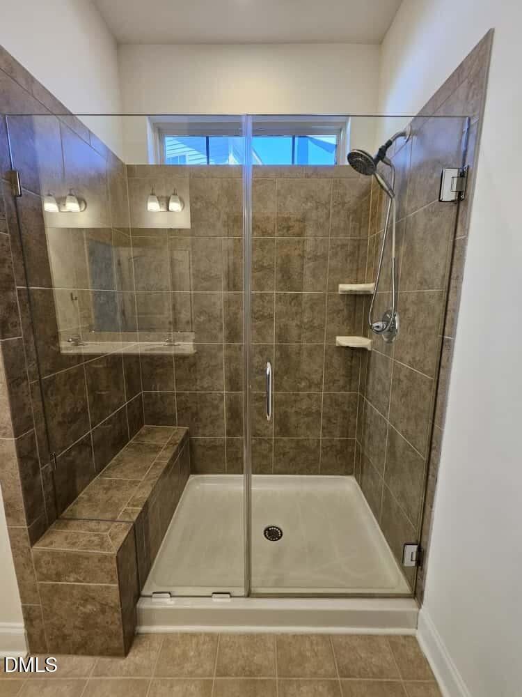 4305 Sir Julian Court Raleigh, NC 27610 - Photo 13 of 25 a bathroom with a shower