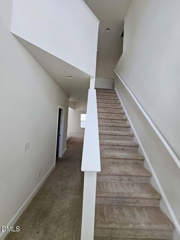 4305 Sir Julian Court Raleigh, NC 27610 - Photo 17 of 25 a view of entryway with stairs