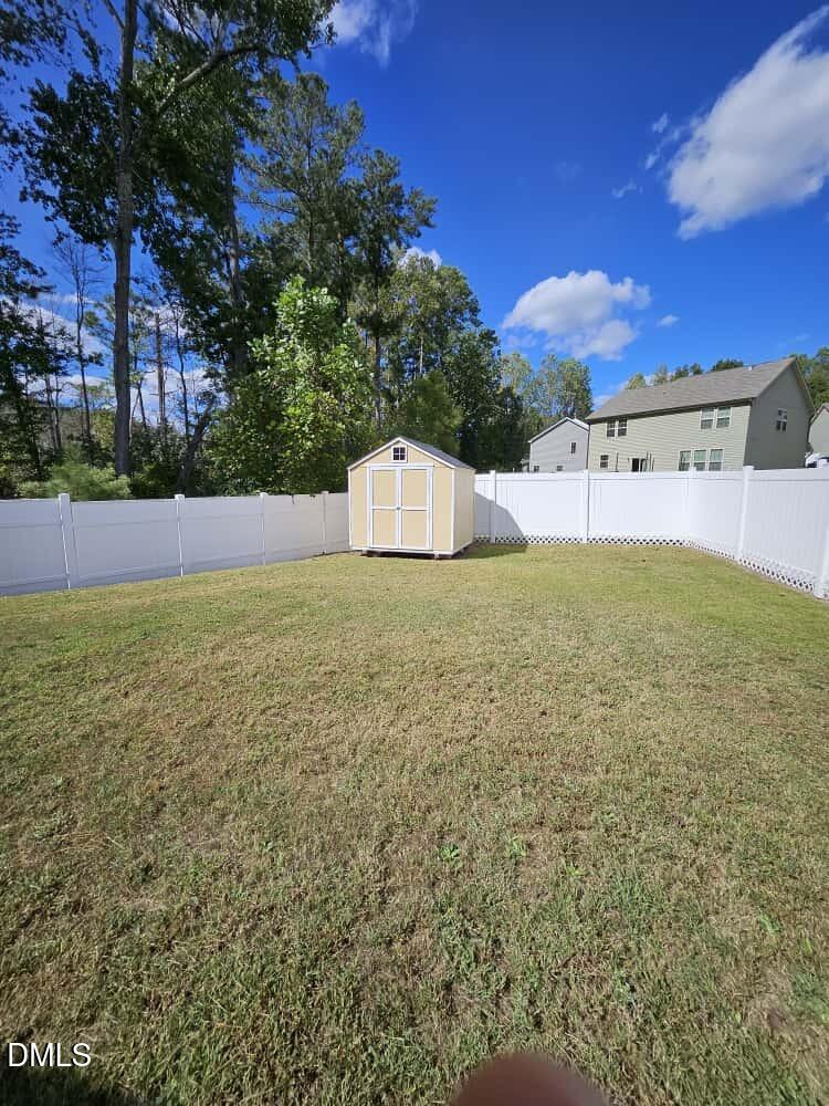 4305 Sir Julian Court Raleigh, NC 27610 - Photo 23 of 25 a view of an outdoor space and a yard