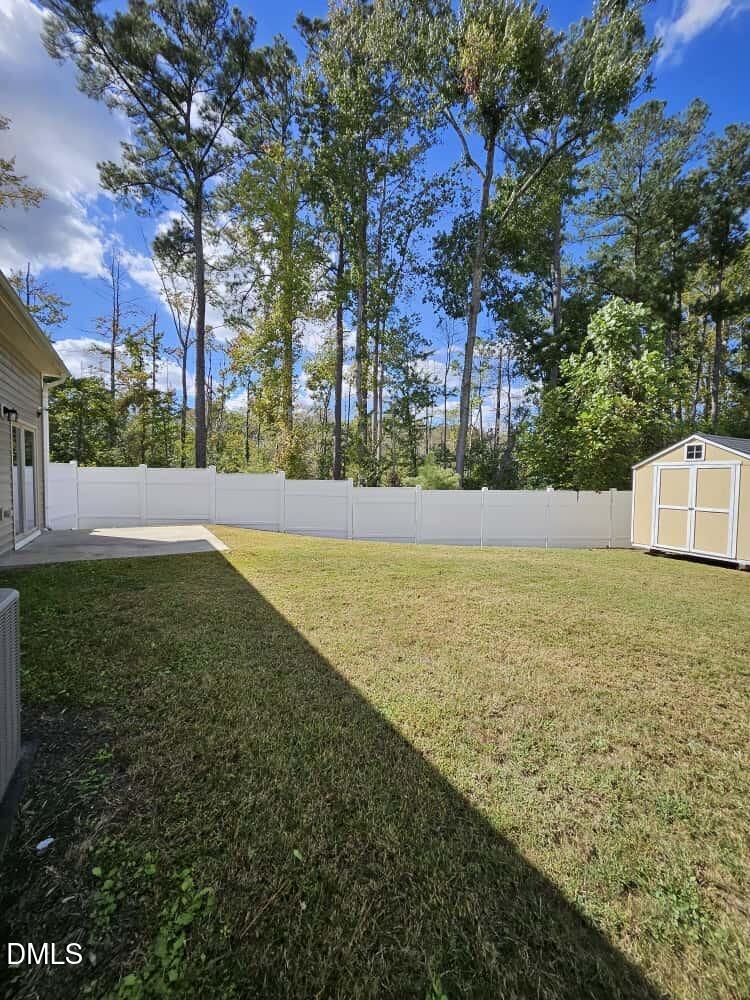 4305 Sir Julian Court Raleigh, NC 27610 - Photo 24 of 25 a view of an outdoor space and a yard