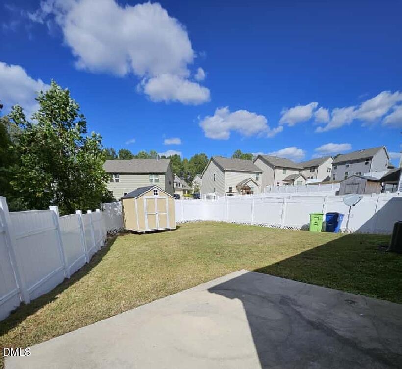 4305 Sir Julian Court Raleigh, NC 27610 - Photo 25 of 25 a view of a yard in front of the house