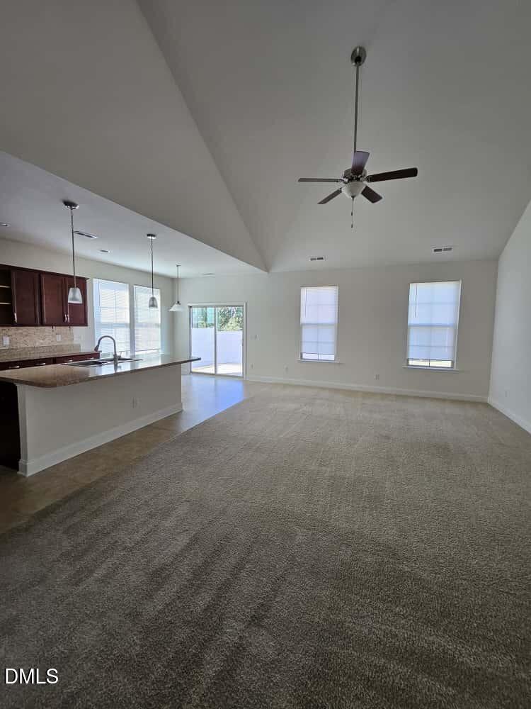 4305 Sir Julian Court Raleigh, NC 27610 - Photo 5 of 25 a view of a kitchen with a sink cabinets and window