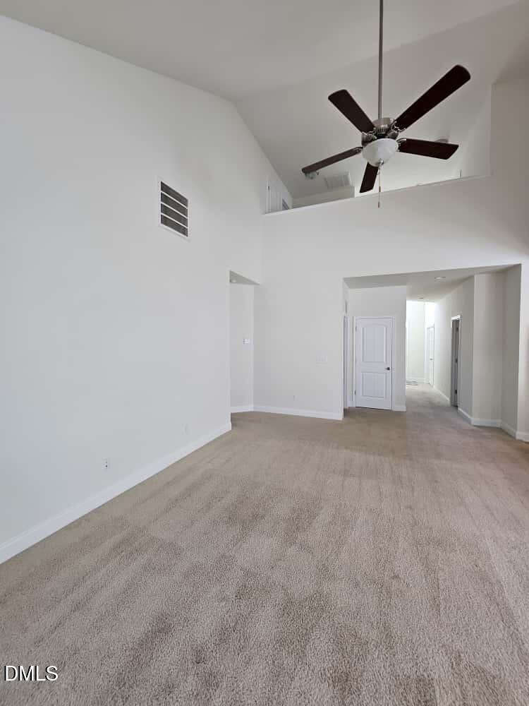 4305 Sir Julian Court Raleigh, NC 27610 - Photo 6 of 25 a view of a room with a ceiling fan