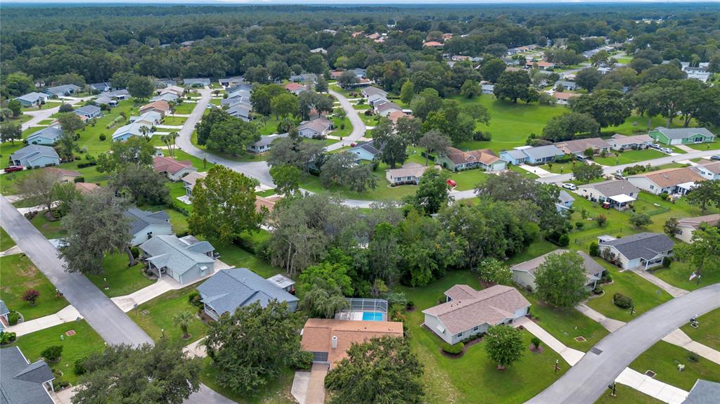 8012 Southwest 109th Place Road Ocala, FL 34481 - Photo 20 of 20 an aerial view of residential houses with outdoor space