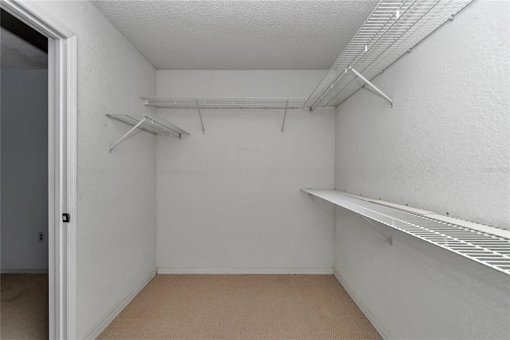 8012 Southwest 109th Place Road Ocala, FL 34481 - Photo 9 of 20 a view of a room with racks on the wall