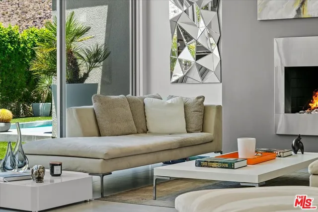 a kitchen with stainless steel appliances a sink and a large window