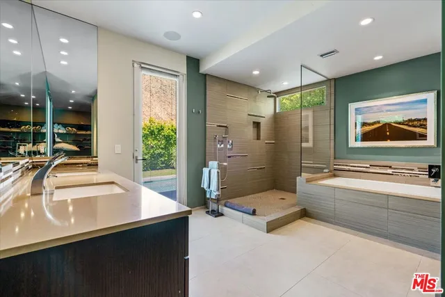 a view of a chairs and tables in the park