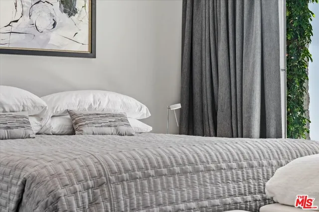 a outdoor living space with furniture and city view