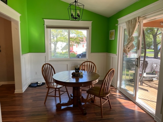 606 North 3rd Street Rochelle, IL 61068 - Photo 11 of 36 a view of a dining room with furniture window and wooden floor