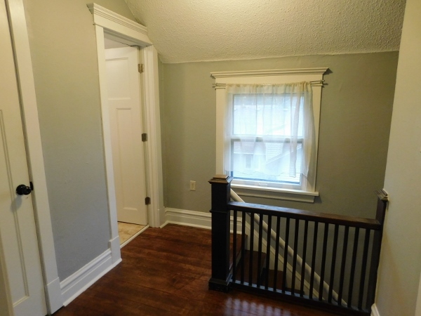 606 North 3rd Street Rochelle, IL 61068 - Photo 19 of 36 a view of a room with wooden floor and windows