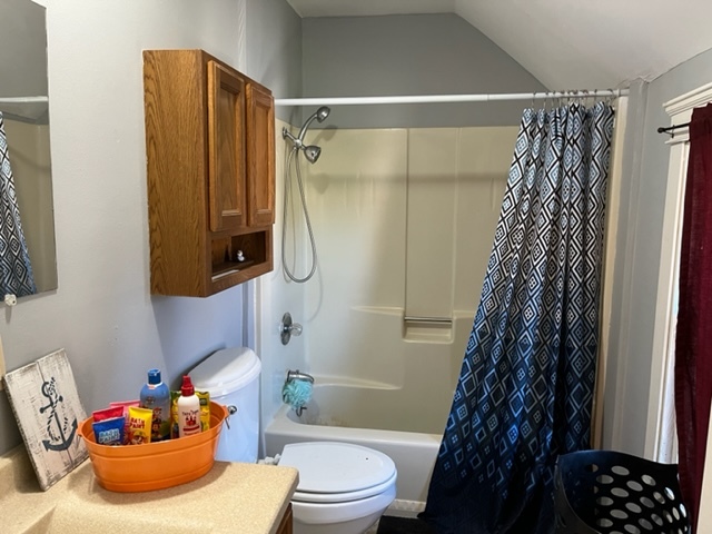 606 North 3rd Street Rochelle, IL 61068 - Photo 22 of 36 a bathroom with a sink toilet and shower