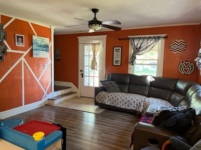 606 North 3rd Street Rochelle, IL 61068 - Photo 4 of 36 a living room with furniture and a window