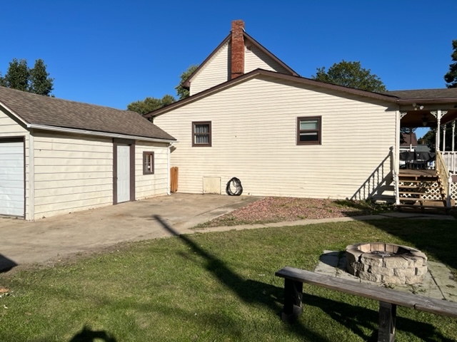 606 North 3rd Street Rochelle, IL 61068 - Photo 32 of 36 a view of a house with backyard and sitting area