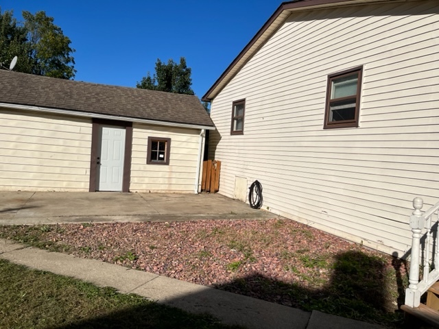 606 North 3rd Street Rochelle, IL 61068 - Photo 33 of 36 a house view with a backyard space