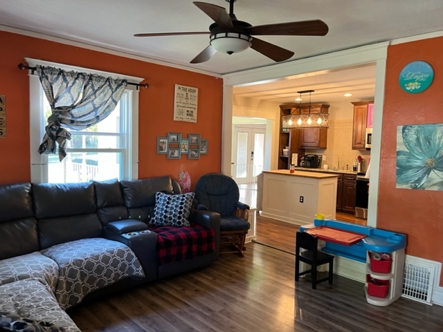 606 North 3rd Street Rochelle, IL 61068 - Photo 5 of 36 a living room with furniture and a window