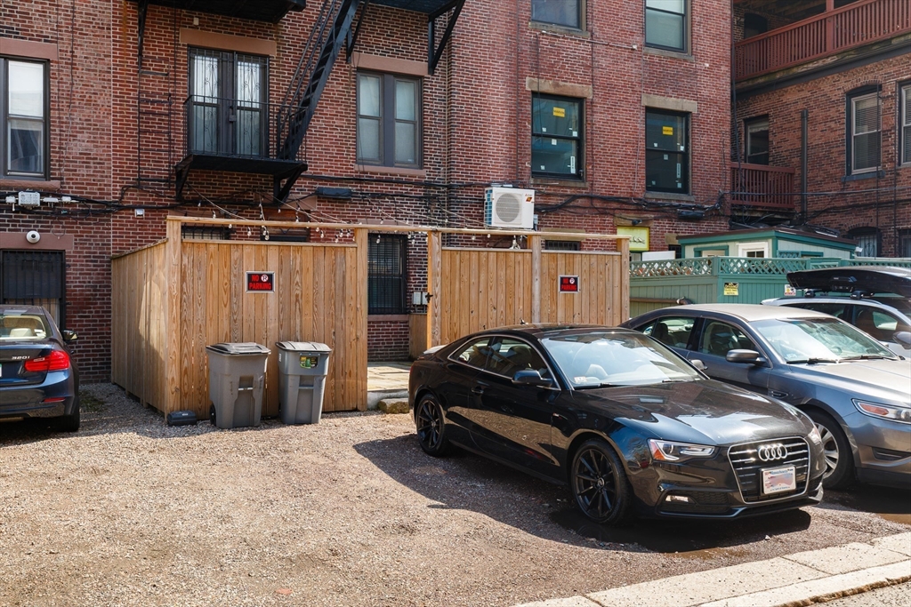 193 St Botolph Street, Unit 1 Boston, MA 02115 - Photo 12 of 15 a car parked in front of a building