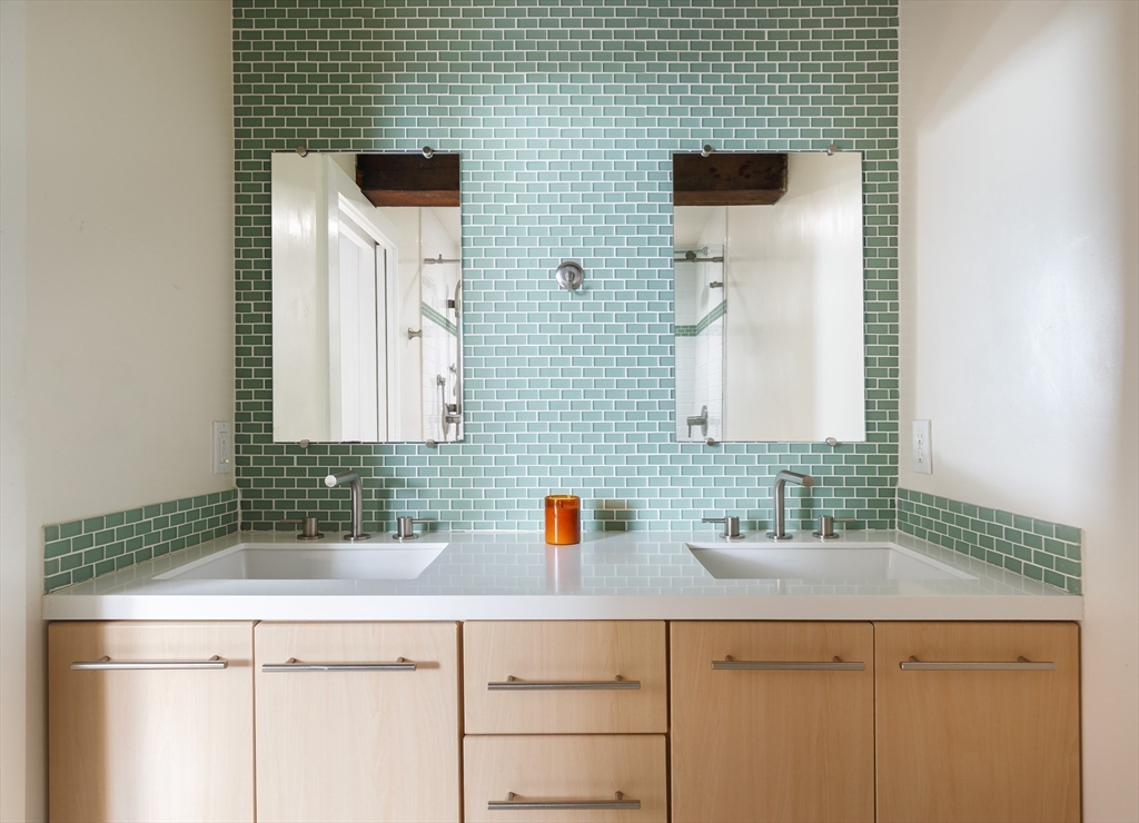 193 St Botolph Street, Unit 1 Boston, MA 02115 - Photo 7 of 15 a bathroom with a sink and a mirror
