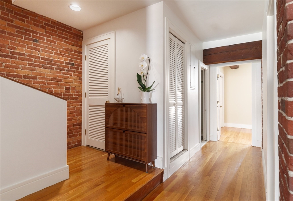 193 St Botolph Street, Unit 1 Boston, MA 02115 - Photo 9 of 15 a view of room with wooden floor