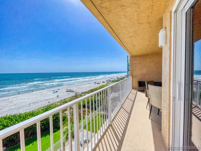 a view of swimming pool with a yard