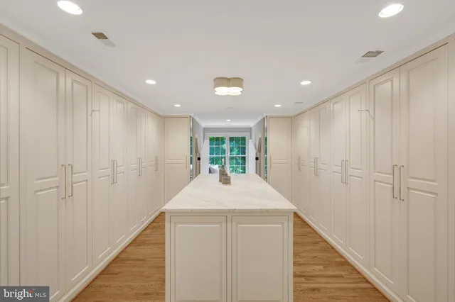 a bathroom with a shower a toilet and a sink