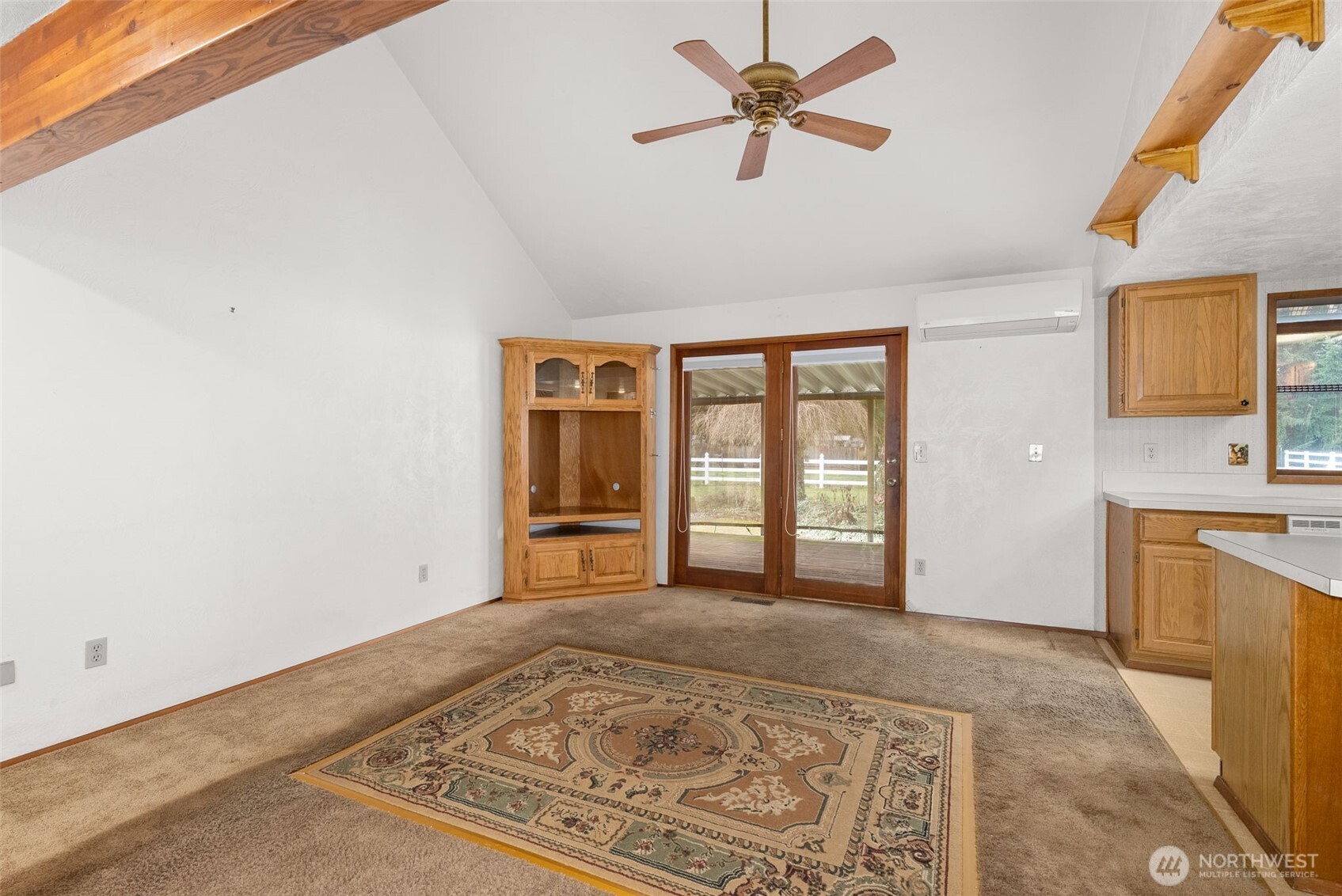 141 East Deer Creek Road Shelton, WA 98584 - Photo 11 of 40 a view of a livingroom with a stove and a window