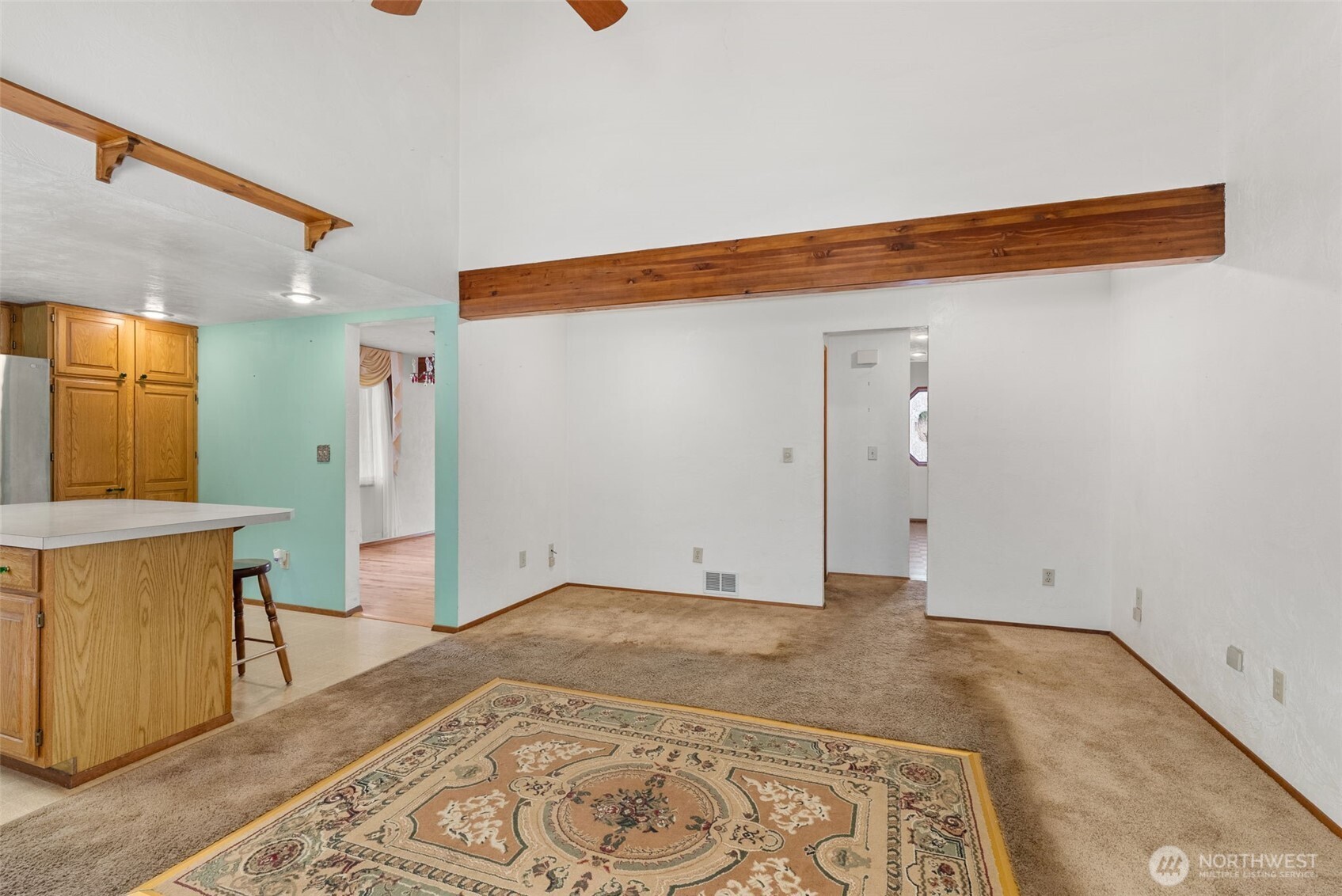141 East Deer Creek Road Shelton, WA 98584 - Photo 12 of 40 a view of a livingroom with wooden floor and a bathroom