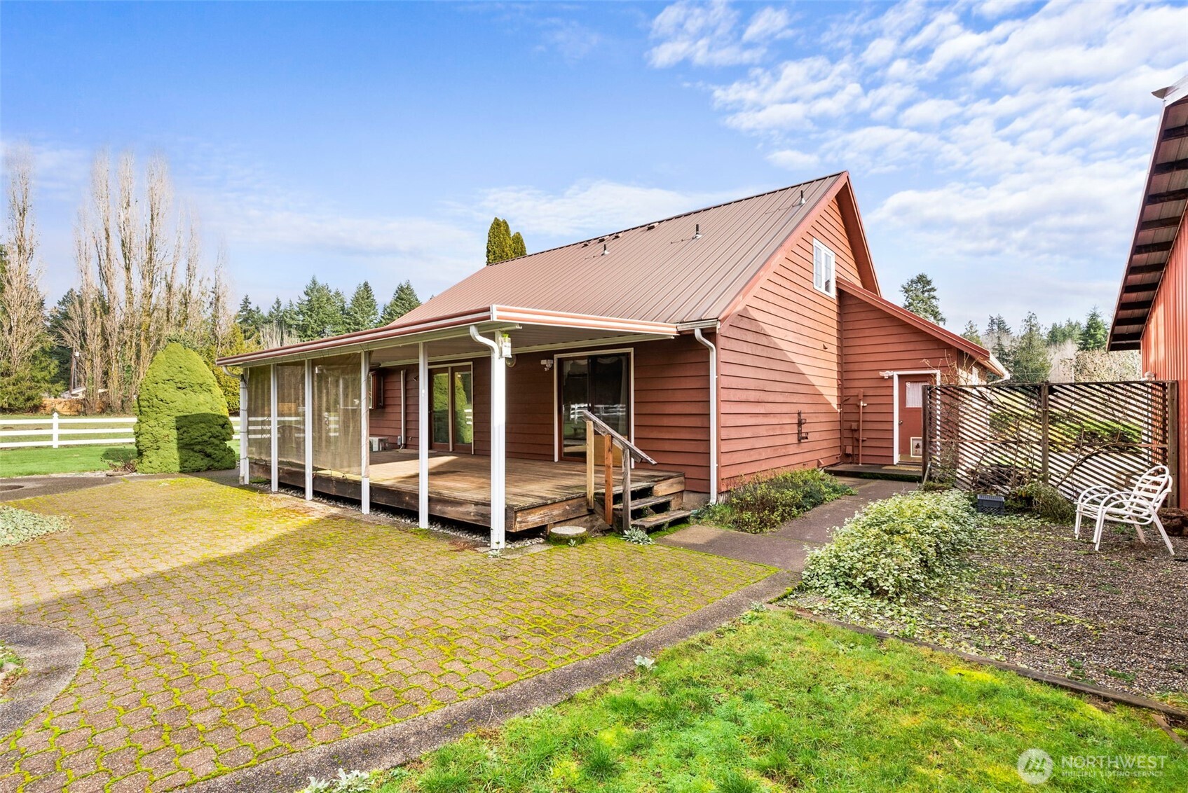 141 East Deer Creek Road Shelton, WA 98584 - Photo 31 of 40 a view of a house with backyard and sitting area