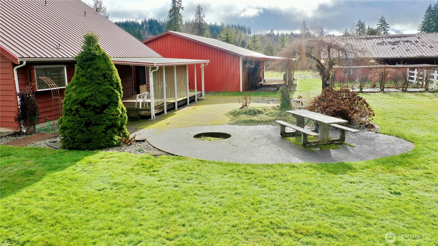 141 East Deer Creek Road Shelton, WA 98584 - Photo 35 of 40 a view of a house with backyard porch and sitting area