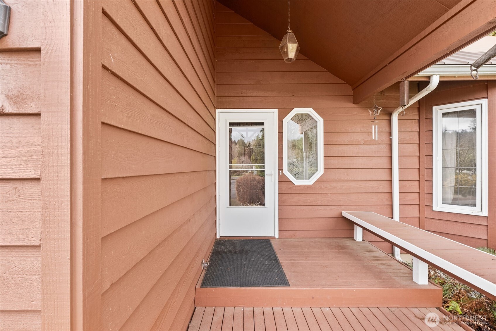 141 East Deer Creek Road Shelton, WA 98584 - Photo 4 of 40 a view of balcony with a large window and wooden floor