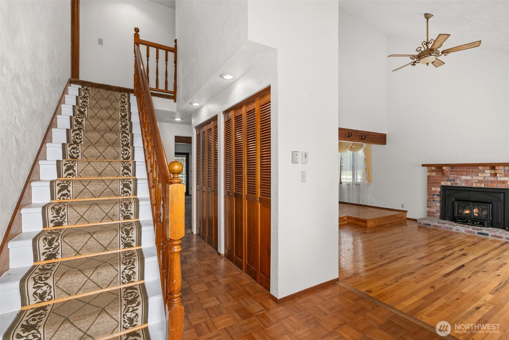 141 East Deer Creek Road Shelton, WA 98584 - Photo 6 of 40 a view of an entryway with a fireplace