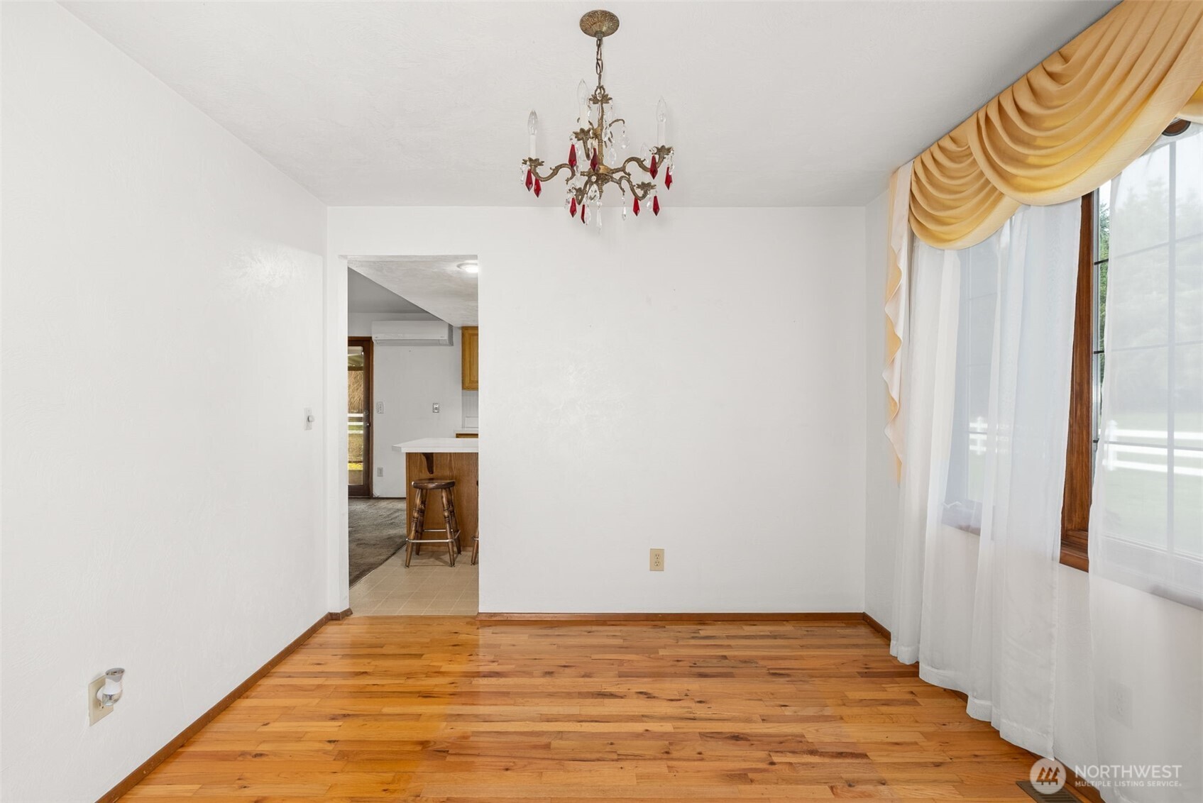 141 East Deer Creek Road Shelton, WA 98584 - Photo 10 of 40 a view of a hallway with a chandelier