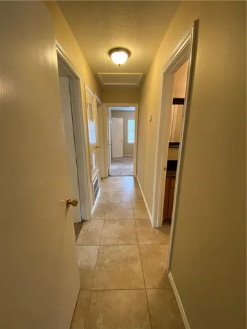 a view of hallway with stairs