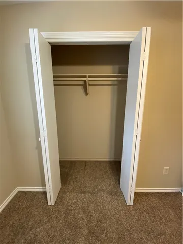 an empty room with closet