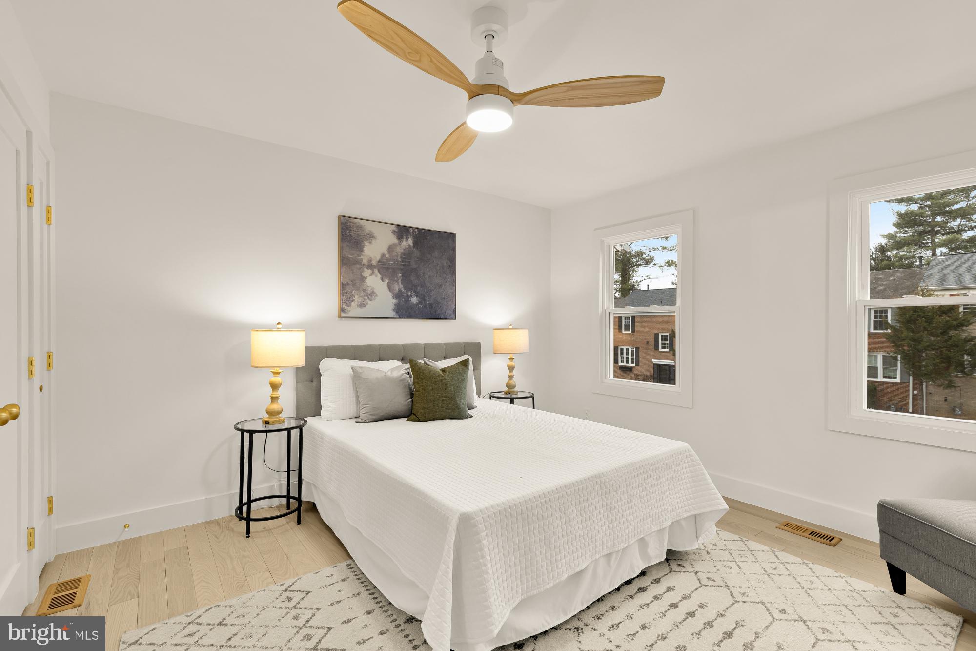 9532 Burdett Road Burke, VA 22015 - Photo 16 of 35 a bedroom with a bed and a window