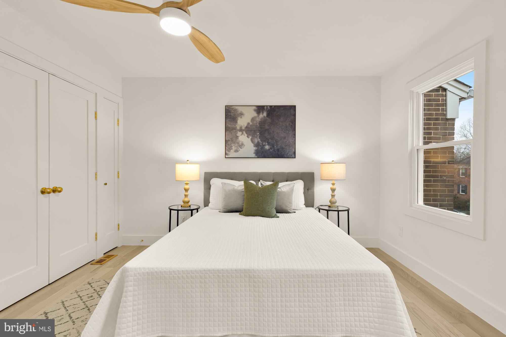 9532 Burdett Road Burke, VA 22015 - Photo 17 of 35 a bedroom with a bed and a window