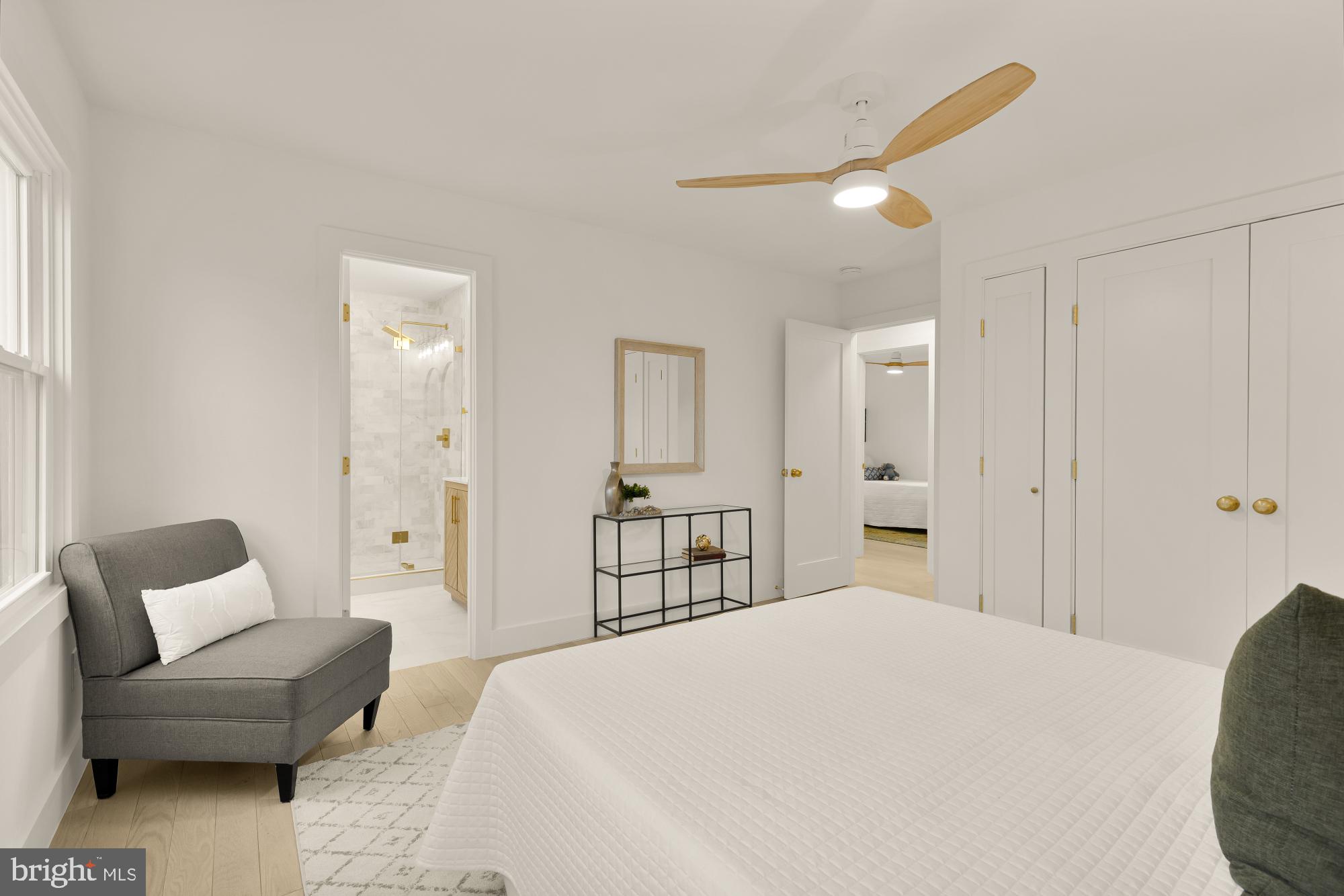 9532 Burdett Road Burke, VA 22015 - Photo 18 of 35 a bedroom with a bed and a couch