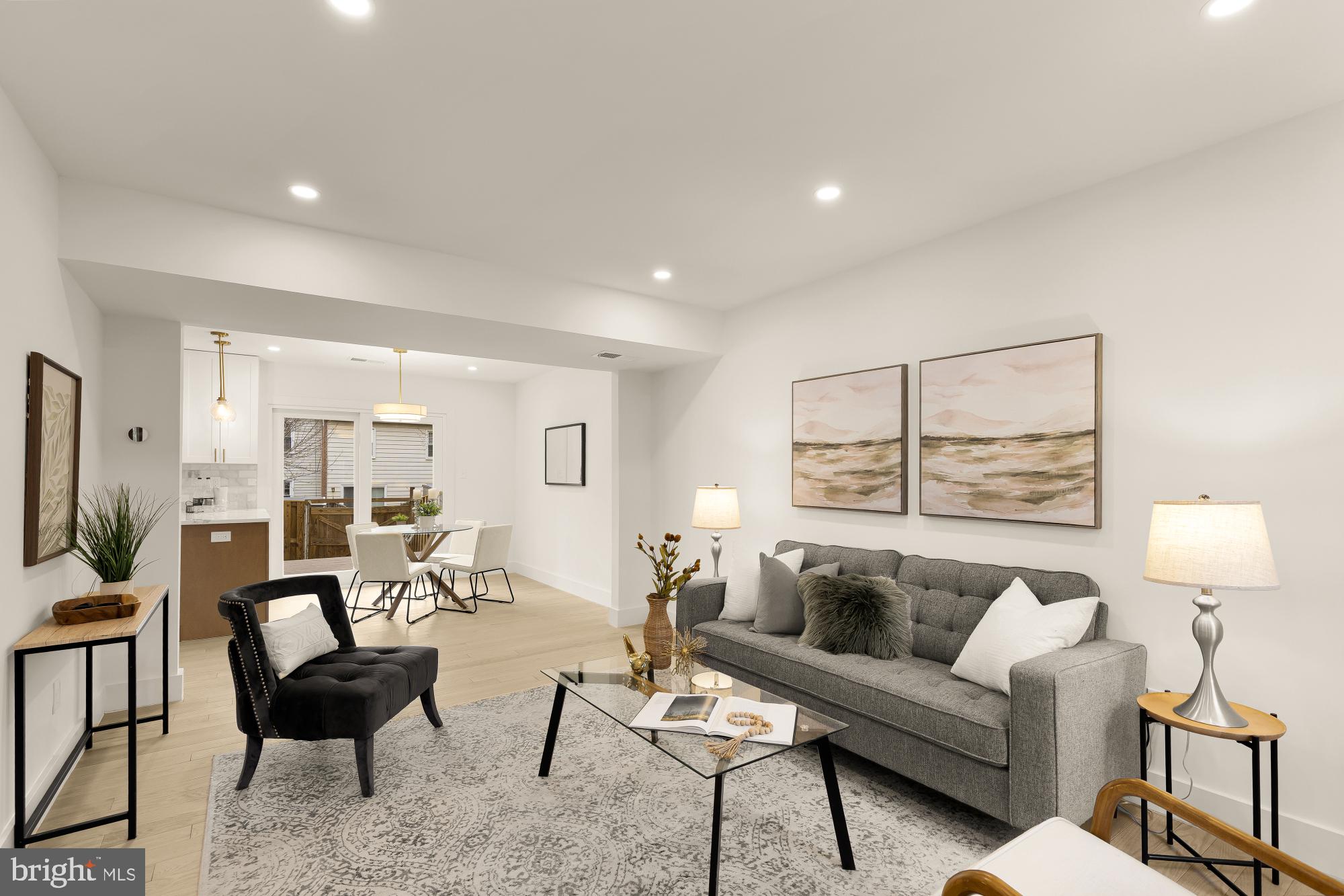 9532 Burdett Road Burke, VA 22015 - Photo 4 of 35 a living room with furniture and a lamp