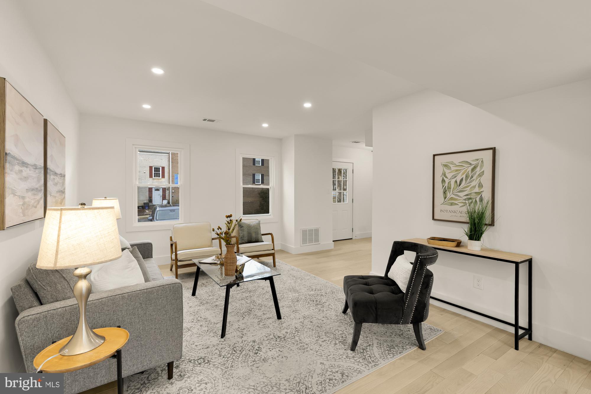 9532 Burdett Road Burke, VA 22015 - Photo 6 of 35 a living room with furniture and a window